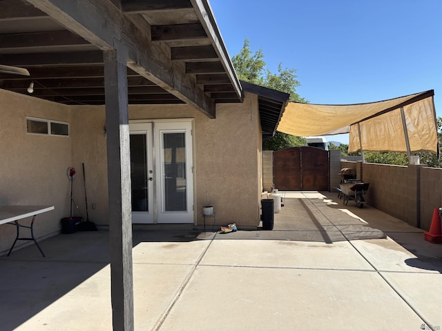 view of patio featuring french doors