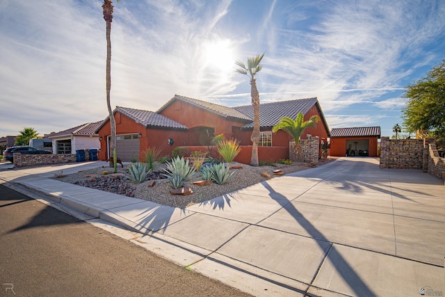 view of front of property featuring a garage