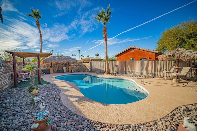 view of pool featuring a patio area