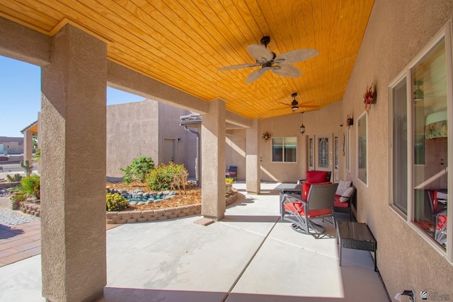 view of patio / terrace featuring ceiling fan