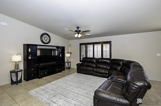 tiled living room featuring ceiling fan