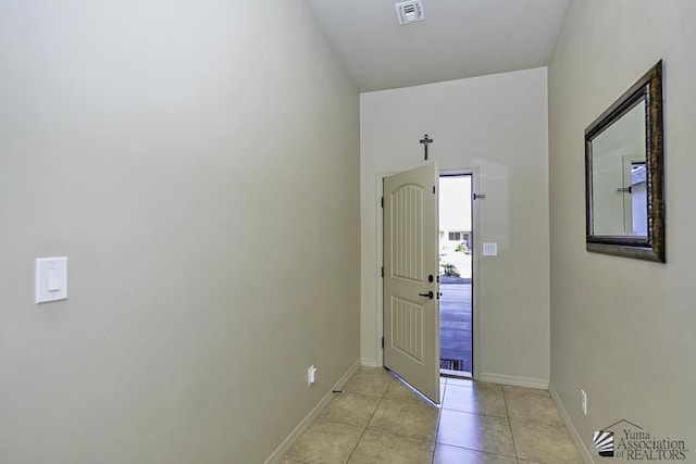 view of tiled foyer entrance