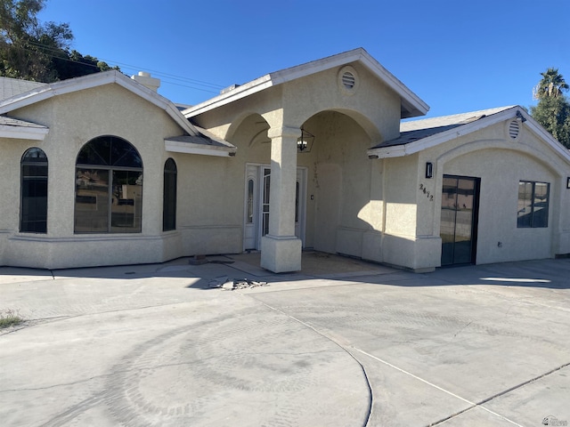 view of front of house featuring a patio area