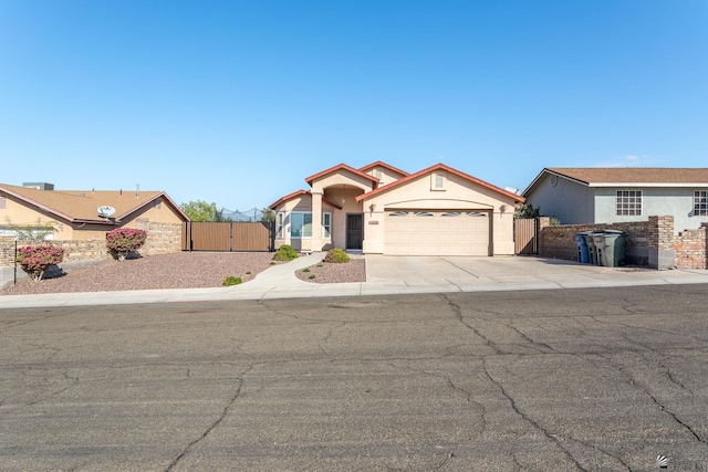 view of front of property with a garage