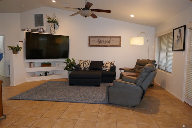 living room featuring built in features, light tile patterned floors, and lofted ceiling