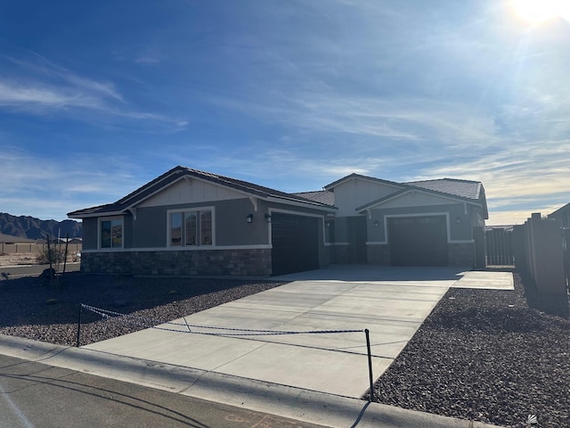 ranch-style home featuring a garage