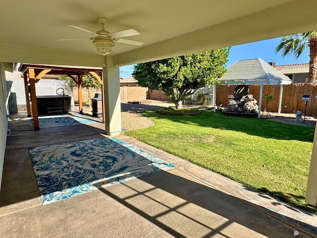 view of patio featuring grilling area and ceiling fan