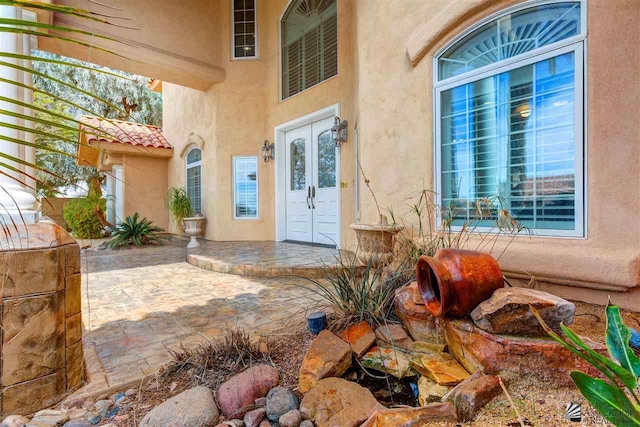 doorway to property with french doors