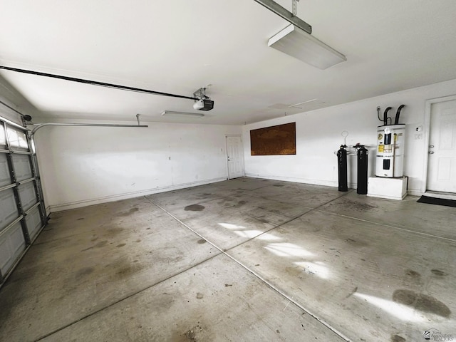 garage featuring secured water heater and a garage door opener