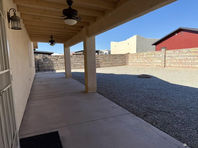 view of patio featuring ceiling fan