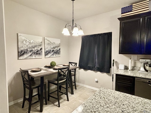 tiled dining room with a notable chandelier