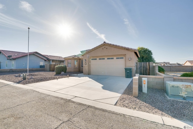 ranch-style home with a garage