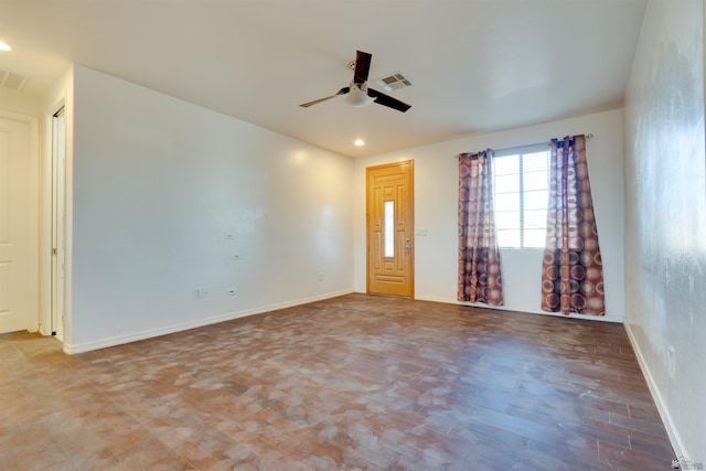 empty room featuring ceiling fan