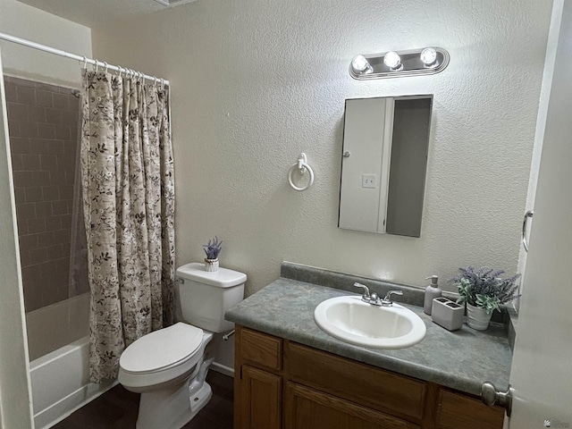 full bathroom with vanity, toilet, and shower / tub combo with curtain