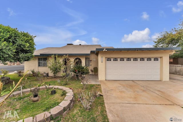 ranch-style home with a garage