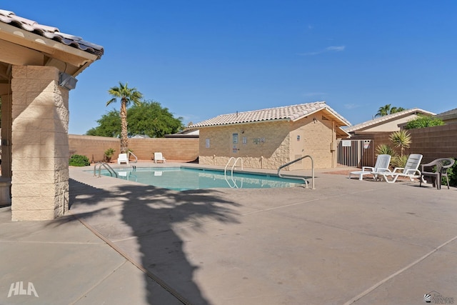 view of pool with a patio area