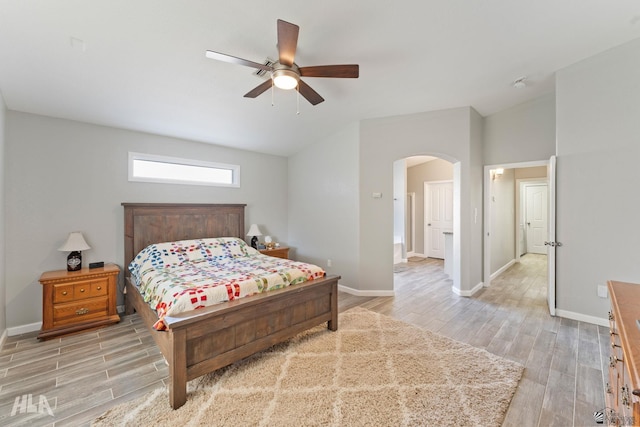 bedroom with ceiling fan and light hardwood / wood-style flooring