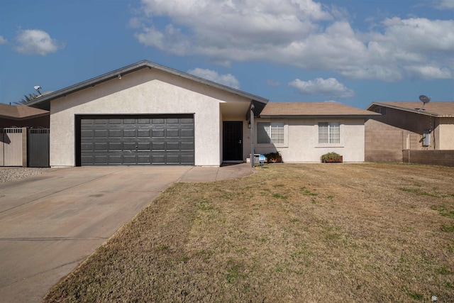 single story home featuring a garage and a front lawn