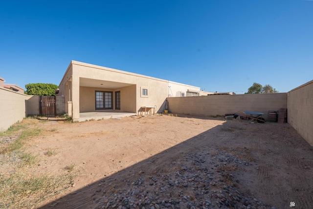 rear view of property with a patio