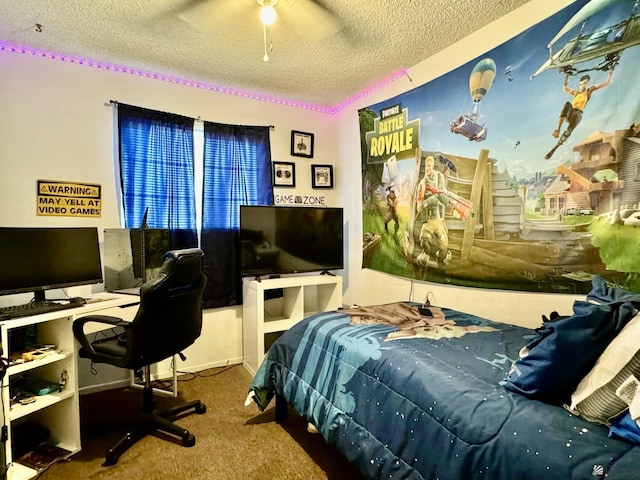 carpeted bedroom featuring ceiling fan and a textured ceiling