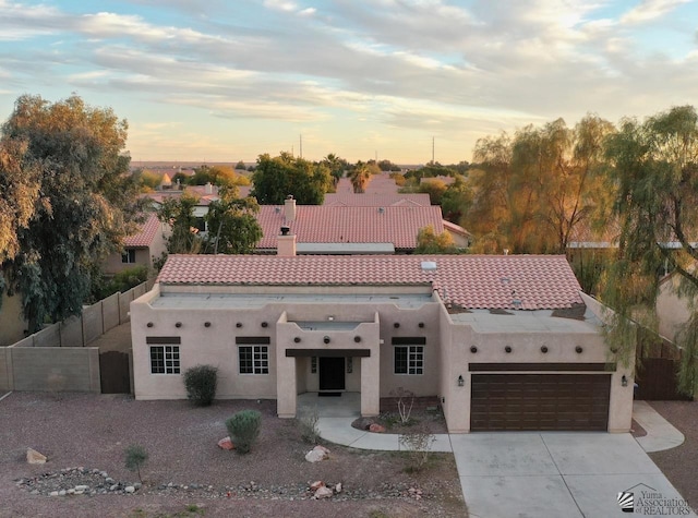 view of front of property with a garage