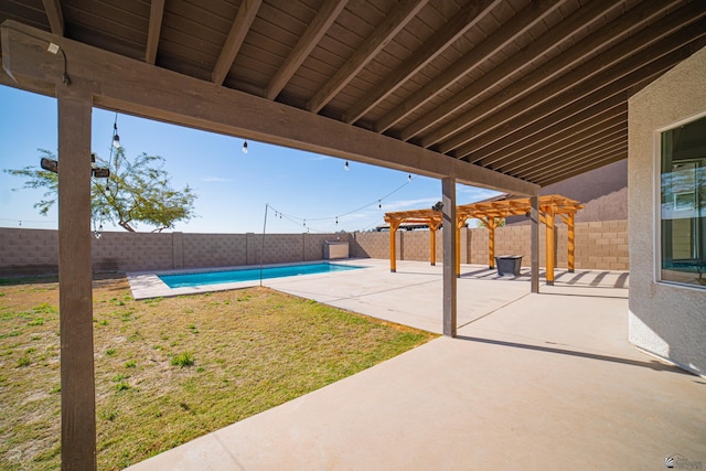 view of patio / terrace featuring a fenced in pool and a pergola