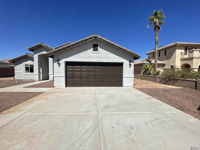 view of front of home with a garage