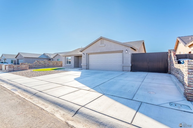 ranch-style house featuring a garage