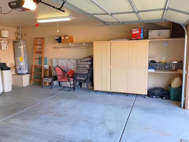 garage featuring water heater and a garage door opener