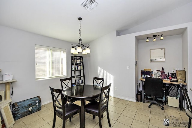 dining area with visible vents, a notable chandelier, baseboards, and light tile patterned floors