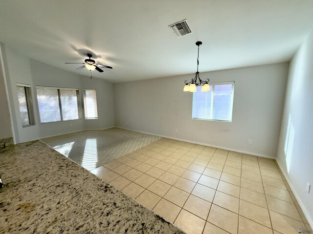 living room featuring carpet floors, ceiling fan, and lofted ceiling