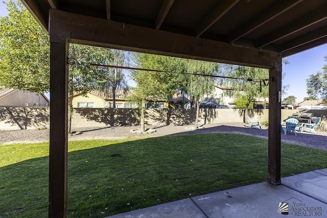 view of yard featuring a fenced backyard and a patio