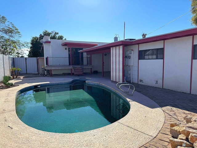 view of pool featuring a patio