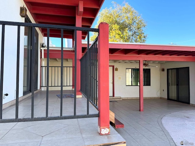 view of patio with ceiling fan