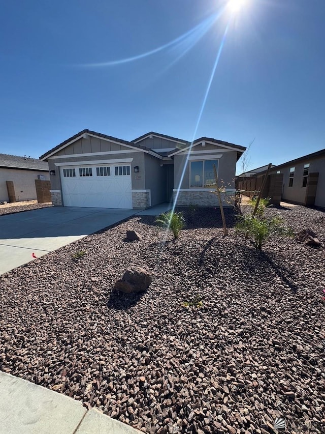 single story home with a garage