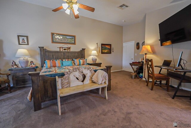 carpeted bedroom with visible vents, baseboards, and a towering ceiling