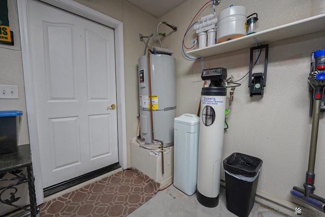 utility room featuring water heater