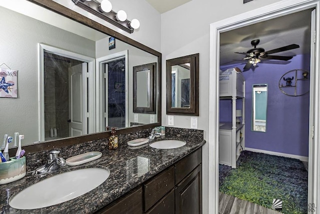 bathroom with vanity and ceiling fan