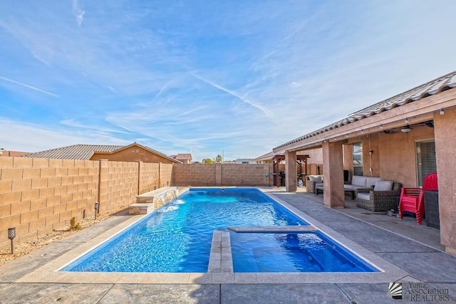 view of pool featuring an outdoor living space, a patio area, pool water feature, and ceiling fan