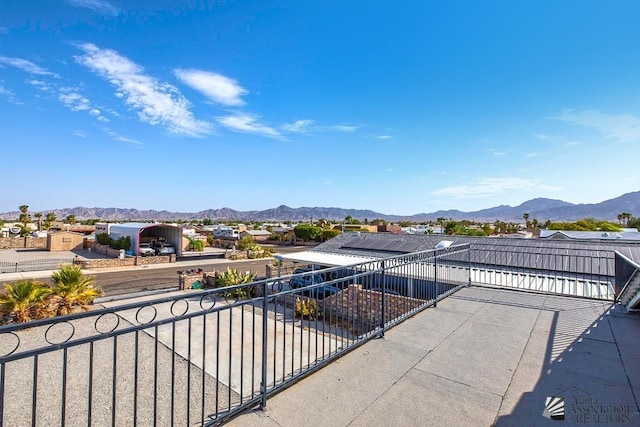 view of patio / terrace with a mountain view