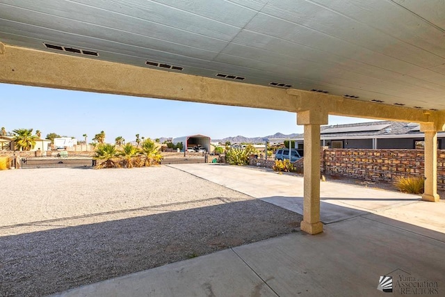 view of patio with a mountain view