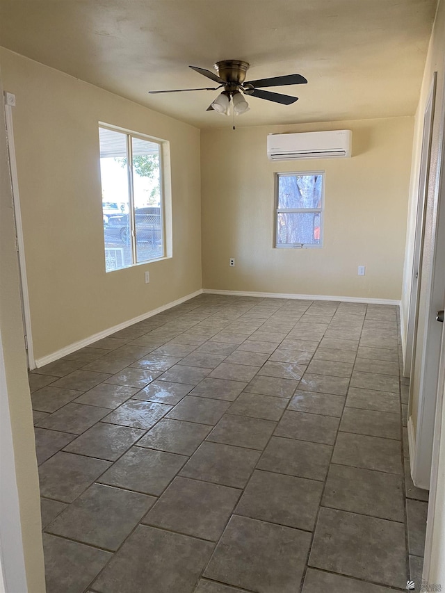 empty room with ceiling fan and an AC wall unit