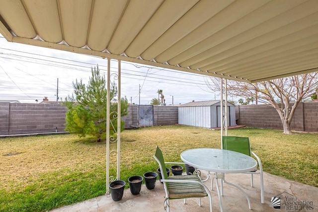 view of patio / terrace featuring a shed