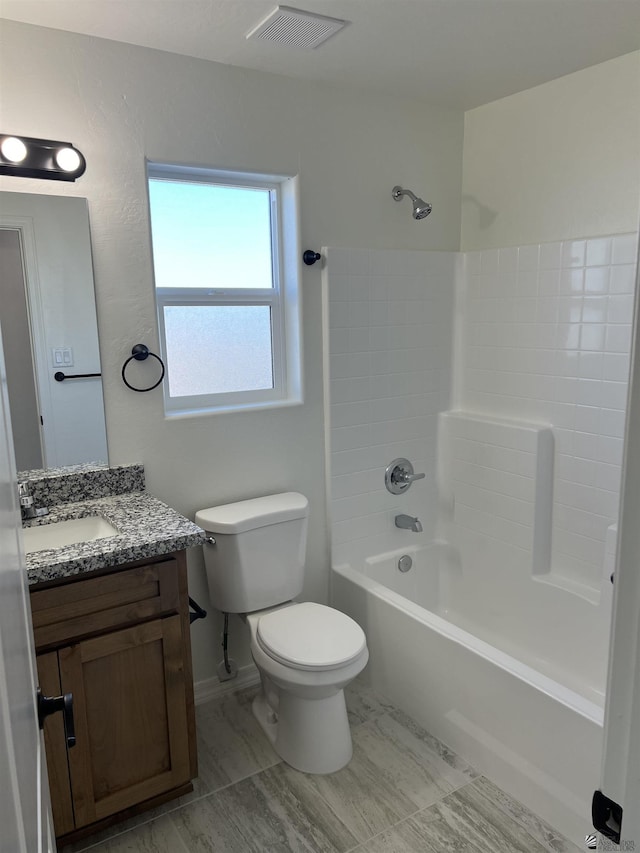 full bathroom featuring vanity, toilet, and washtub / shower combination