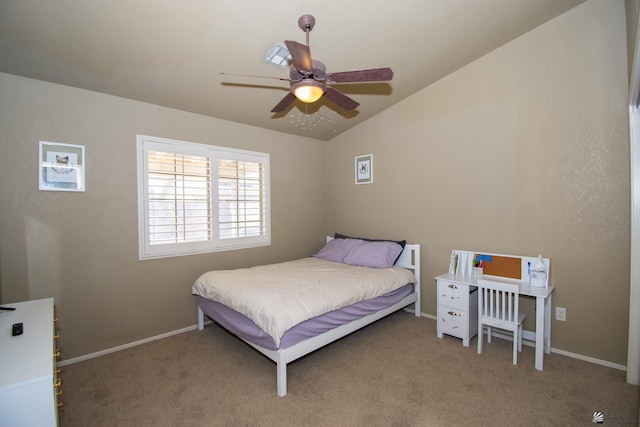 carpeted bedroom with vaulted ceiling, visible vents, a ceiling fan, and baseboards