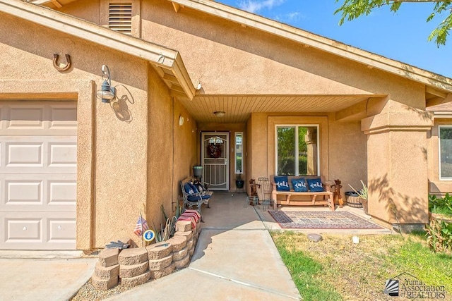 property entrance featuring a garage