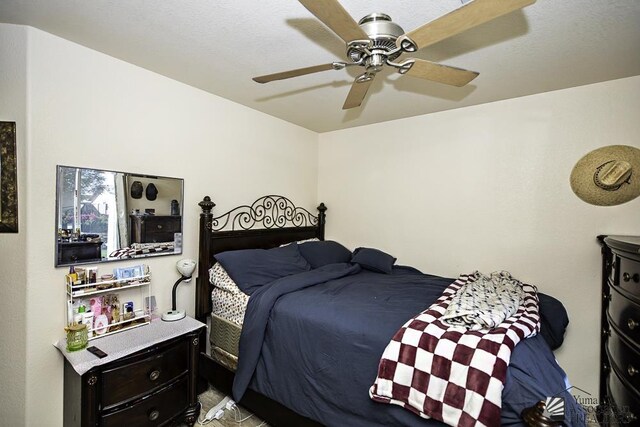 bedroom featuring ceiling fan