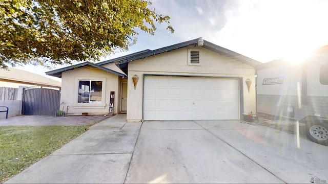 single story home featuring a garage