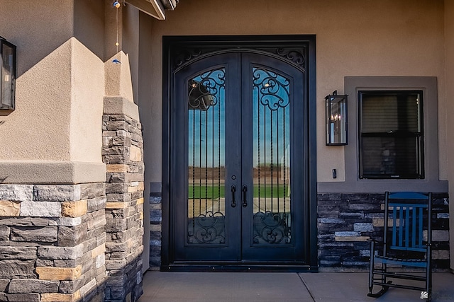 doorway to property featuring french doors