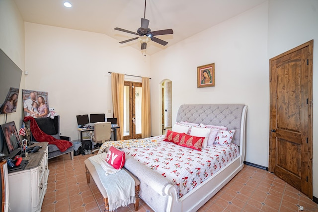 bedroom with tile patterned floors, ceiling fan, and vaulted ceiling